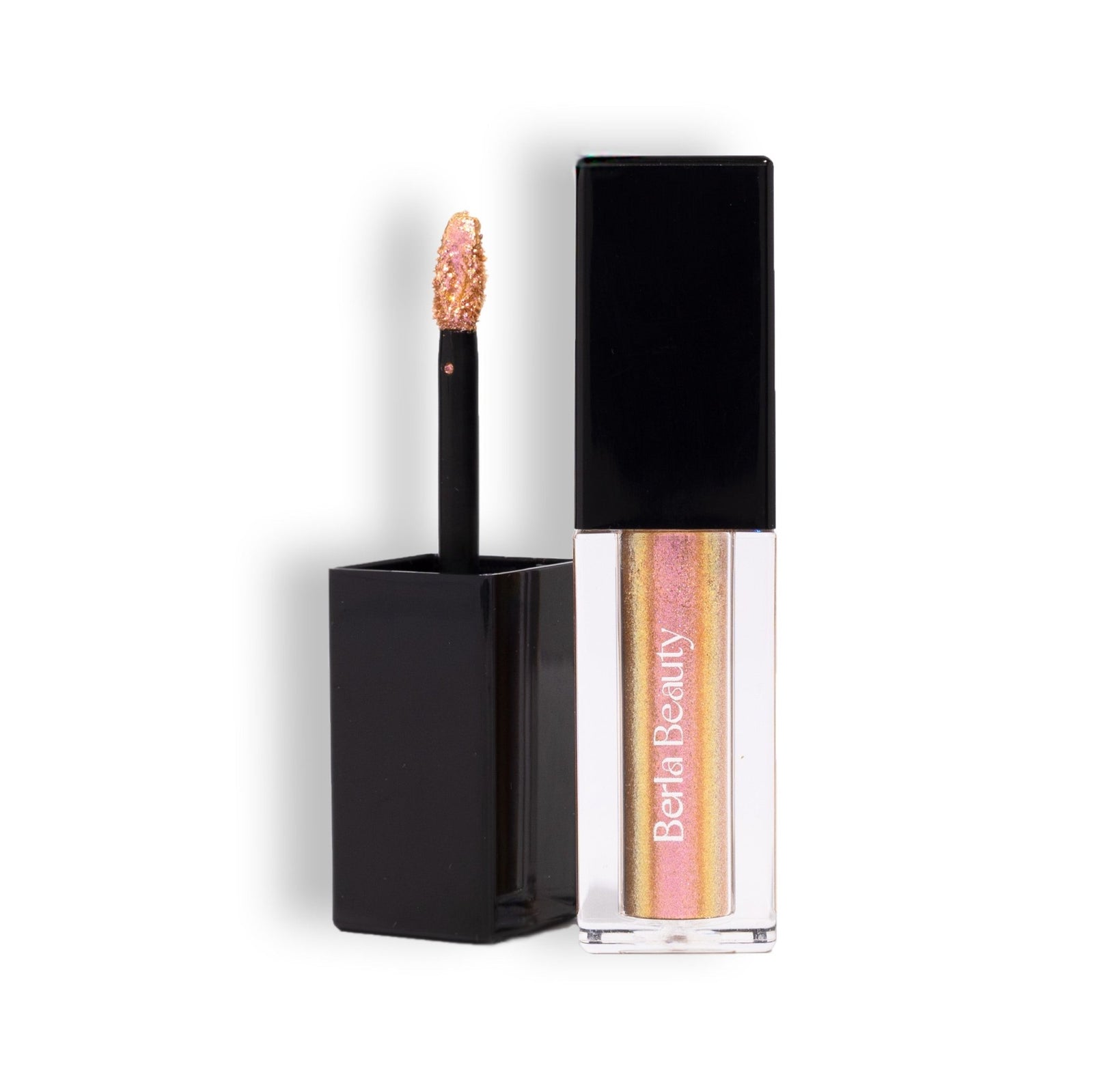 A rectangular liquid eyeshadow tube with a black cap is partially unscrewed, revealing a wand applicator. The eyeshadow boasts a long-lasting shimmer in an iridescent gold color and the product label reads "Berla Beauty." The background is a plain beige color.